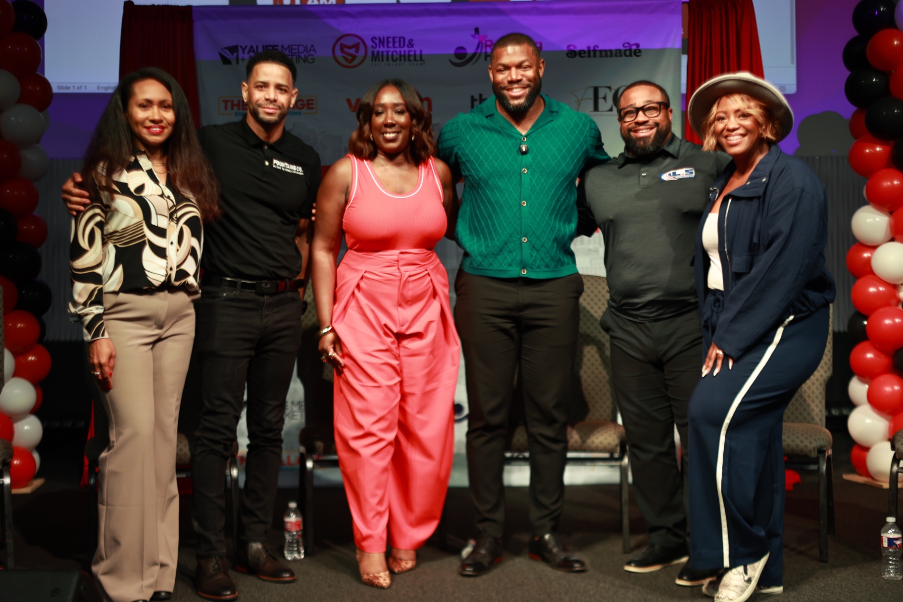 Participants gathered on stage at the Self-Made Houston Experience